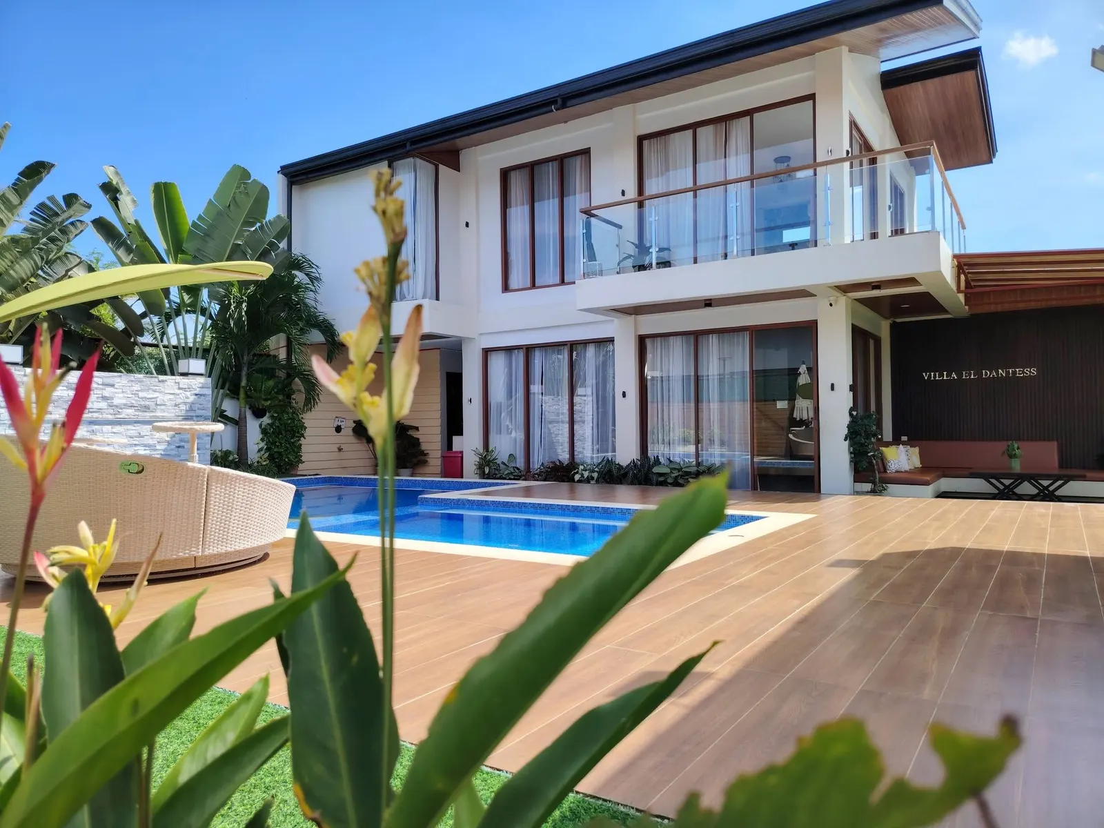 The pool and wooden deck by day