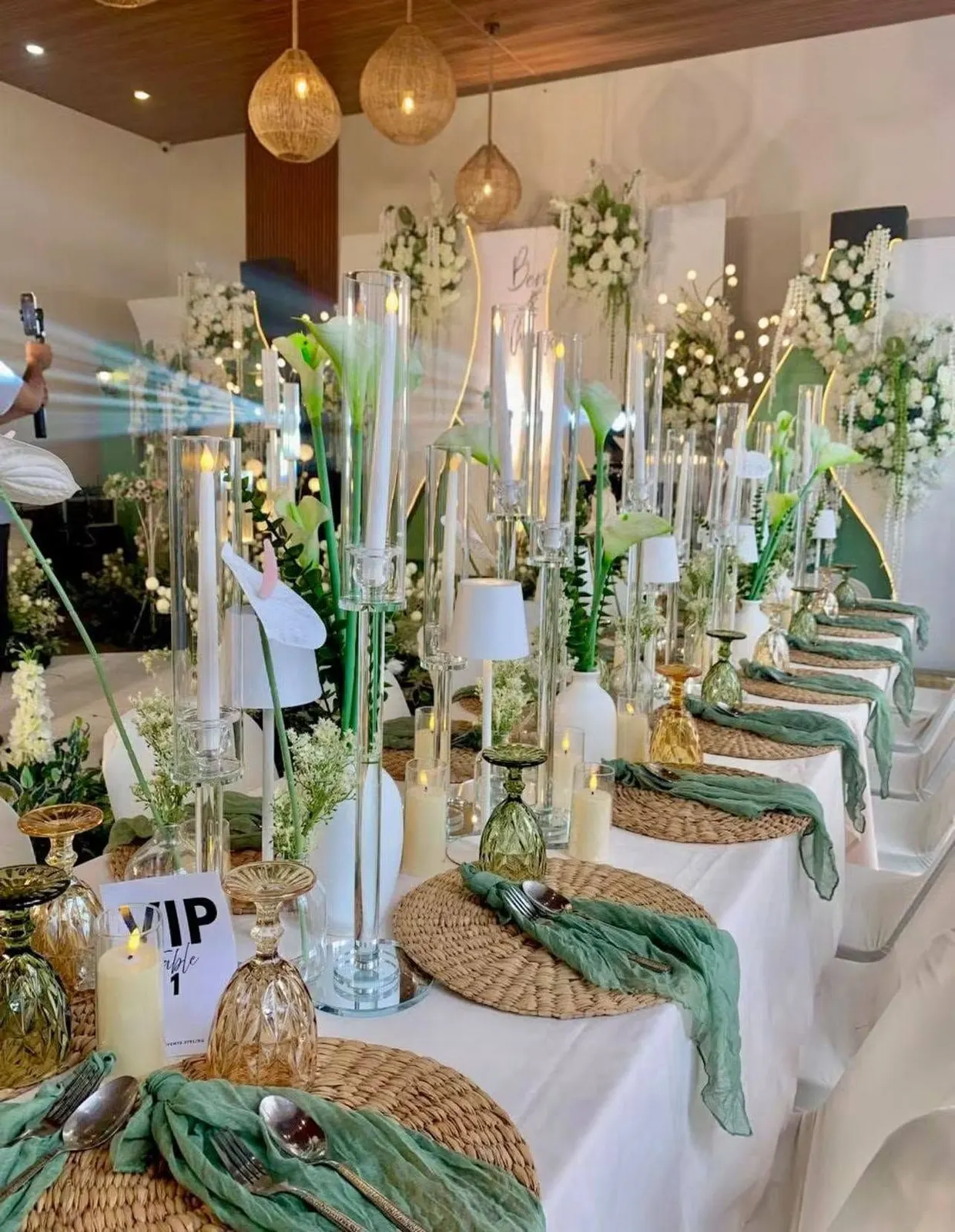 VIP table with candles and sage runners