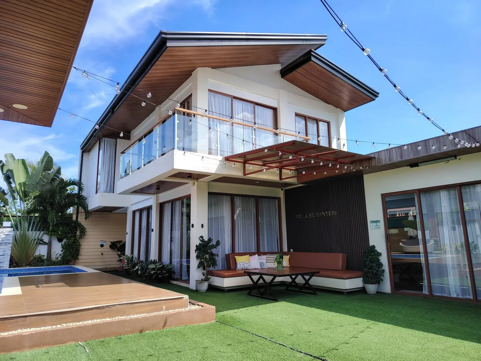 The villa and lawn by day