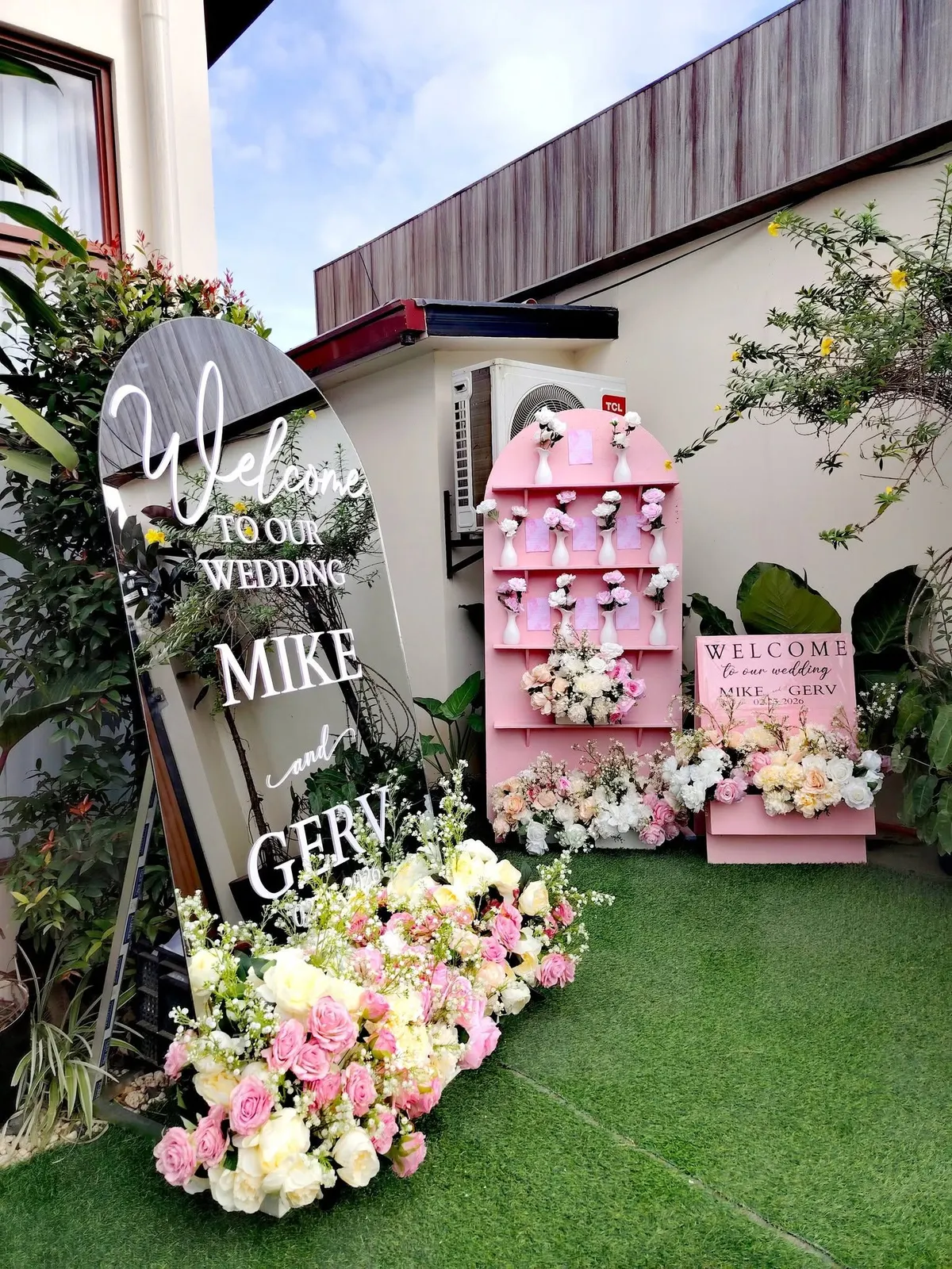 Garden wedding sign and flower wall